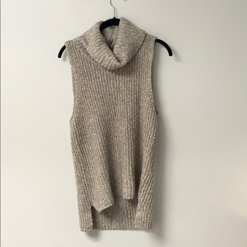 Cable knit turtle neck sleeveless tunic sweater